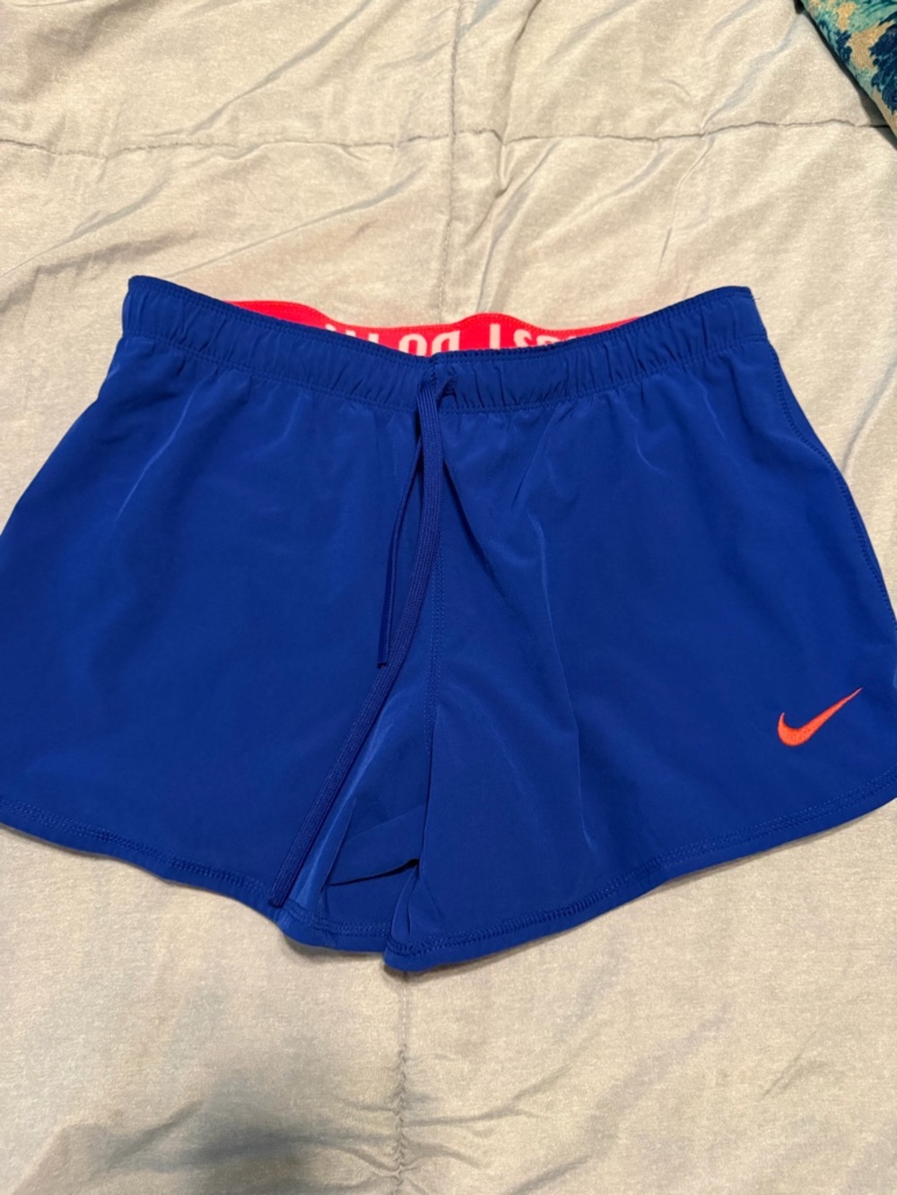Nike DriFit Blue Women's Athletic Shorts with Orangey Coral Swoosh